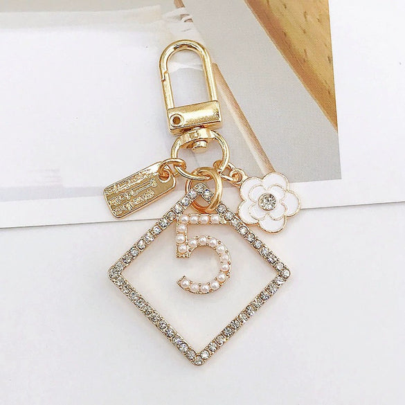 New Style Metal Airpods Protective Case Keychain Pendant With Electroplating For Women