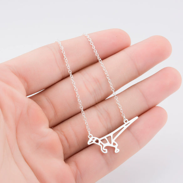 Origami Tyrannosaurus Rex Dinosaur Pendant Necklace In Stainless Steel With Geometric Design And Electroplated Finish For Unisex Wear