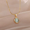 Oval Cat's Eye Pendant Stainless Steel Necklace With Mixed Gemstone Inlay Light Luxury Electroplating Design Unisex Clavicle Chain