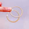 Oversized Twisted Hoop Earrings In Metal With Electroplated Finish And Exaggerated Street Style Design