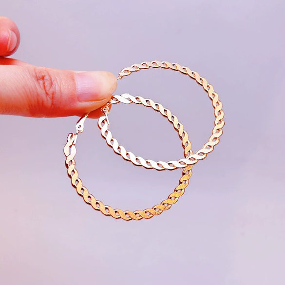 Oversized Twisted Hoop Earrings In Metal With Electroplated Finish And Exaggerated Street Style Design