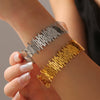 Personality Design Sense Geometric Hollow Irregular Titanium Steel Bracelet With Electroplating Treatment
