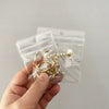 Portable Transparent Perforated Jewelry Earring And Necklace Hanging Storage Bag For Household Use