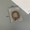 Portable Transparent Perforated Jewelry Earring And Necklace Hanging Storage Bag For Household Use