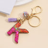 Resin Letter Keychain With Mixed Color Bright Film And Tassel Pendant Modern Art Style Fashionable Bag Pendant Accessories For Men And Women