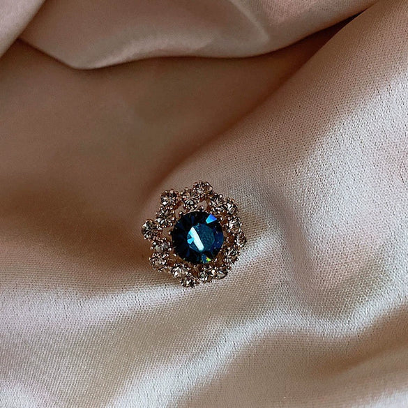 Retro Blue Crystal Alloy Antirunning Light Buckle Brooch With Flower Pattern Electroplated For Women