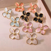 Retro Court Flower Drop Glaze Four Petal Flower Titanium Steel Earrings For Women With Leaf Pattern And Electroplating