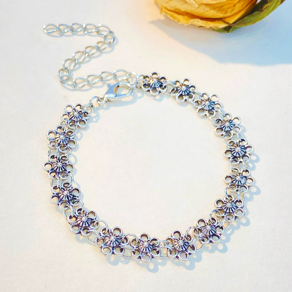 Retro Distressed Flower Alloy Bracelet With Hollow Design And Electroplating For Women