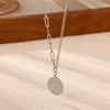 Retro Embossed Lotus Pendant Necklace For Women Gold Plated Geometric Round Pendant With Asymmetrical Titanium Steel Chain