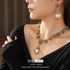 Retro Light Luxury Women's Alloy Pendant Imitation Pearl Earrings With Silver Needle Diamond Flower Pattern And Electroplating Design