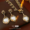 Retro Light Luxury Women's Alloy Pendant Imitation Pearl Earrings With Silver Needle Diamond Flower Pattern And Electroplating Design