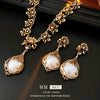 Retro Light Luxury Women's Alloy Pendant Imitation Pearl Earrings With Silver Needle Diamond Flower Pattern And Electroplating Design