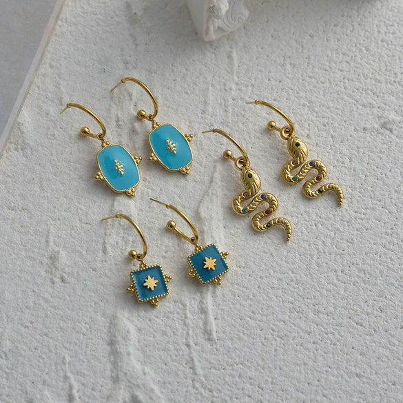 Retro Microinlaid Snakeshaped Titanium Steel Earrings For Women With Electroplating Treatment And Awn Star Design