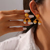 Retro Palace Style Geometric Upside Down U Shaped Imitation Pearl Titanium Steel Earrings With Electroplating