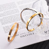 Rose Gold Smooth Oval Titanium Steel Open Cuff Bracelet With Gold Inlaid Finish For Men And Women