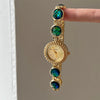Secondhand Luxury Highend Colorful Women's Metal Bracelet Quartz Watch With Cat's Eye Chain And Round Dial