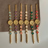 Secondhand Luxury Highend Colorful Women's Metal Bracelet Quartz Watch With Cat's Eye Chain And Round Dial