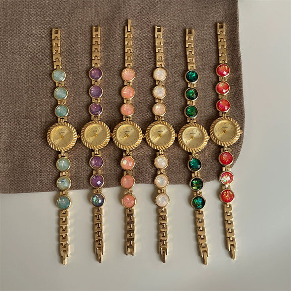 Secondhand Luxury Highend Colorful Women's Metal Bracelet Quartz Watch With Cat's Eye Chain And Round Dial