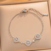 Shiny Women's Star Pattern Titanium Steel Chain Bracelet With 18K Real Gold Plated Copper Accents