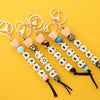Silicone Keychain Bracelet Bag Pendant Round Wood Beads Modern And Minimalist Style