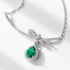 Silver Bow Inlaid Cultured Emerald Clavicle Necklace With Diamond Design
