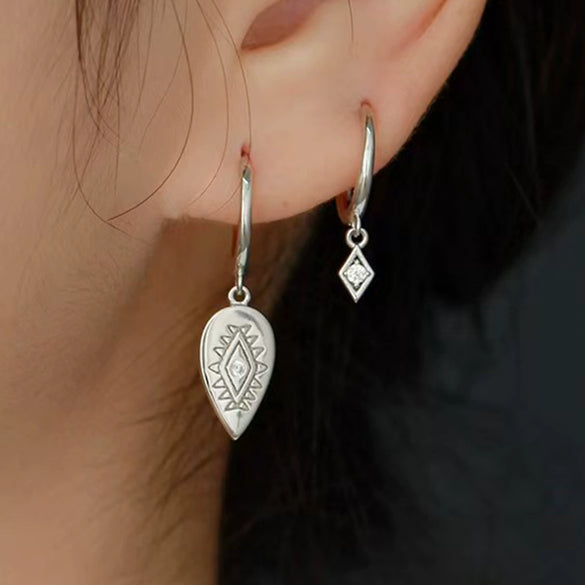 925 Silver Drop Earrings With Devil's Eye Shape And Ancient Egyptian Texture Set With Diamonds