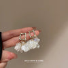 Silver Needle Earrings With Diamond Inlaid Imitation Pearl Petals And Tassel Geometric Shape High End And Versatile Design