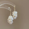 Silver Needle Earrings With Diamond Inlaid Imitation Pearl Petals And Tassel Geometric Shape High End And Versatile Design