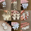 Silver Needle Earrings With Diamond Inlaid Imitation Pearl Petals And Tassel Geometric Shape High End And Versatile Design