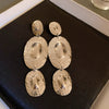 Silver Needle Pattern Oval Tassel Metal Earrings For Women With Electroplating Design