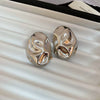 Silver Needle Pattern Oval Tassel Metal Earrings For Women With Electroplating Design