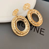 Silver Needle Pattern Oval Tassel Metal Earrings For Women With Electroplating Design