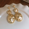 Silver Needle Pattern Oval Tassel Metal Earrings For Women With Electroplating Design
