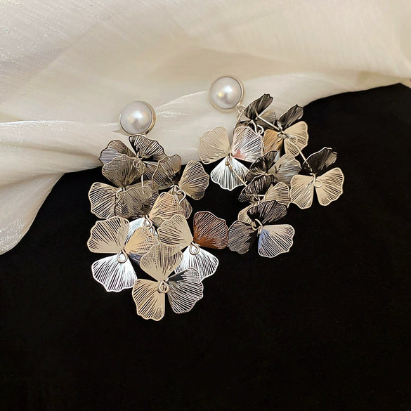 Silver Needle Pattern Oval Tassel Metal Earrings For Women With Electroplating Design
