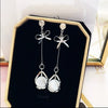 Simple Allmatch Small Fresh Bow Cat's Eye Stone Tassel Earrings For Women Trendy Long Elegant Earrings With Styling Bow Shape Electroplated Alloy And S925 Silver Needle