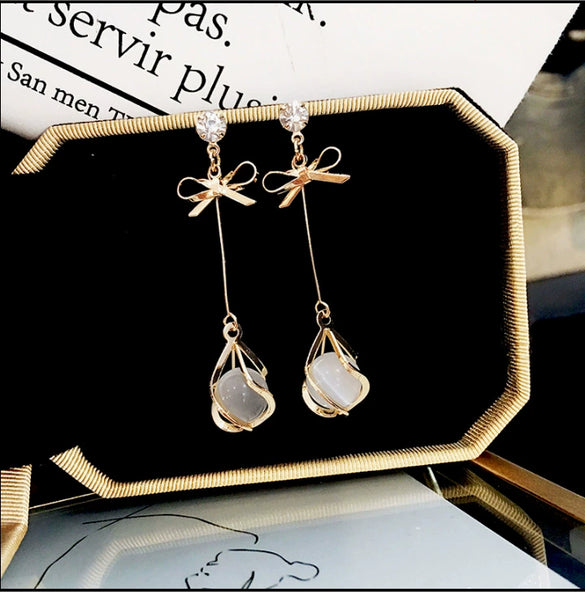 Simple Allmatch Small Fresh Bow Cat's Eye Stone Tassel Earrings For Women Trendy Long Elegant Earrings With Styling Bow Shape Electroplated Alloy And S925 Silver Needle