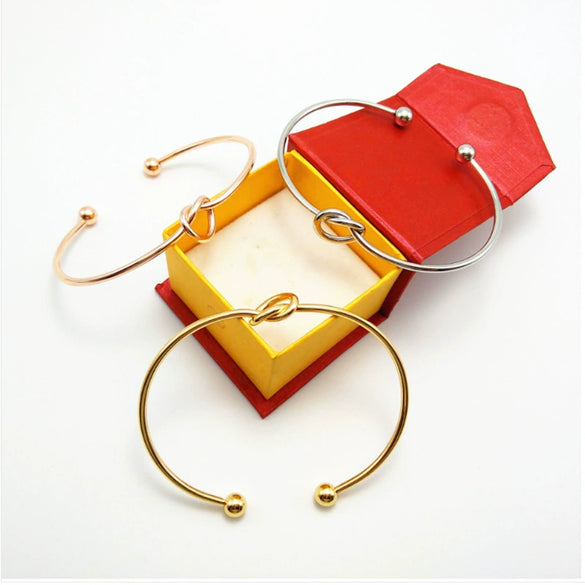 Simple Geometric Love Knot Open Metal Bracelet With Electroplated Finish Minimalist Unisex Cuff Bracelet