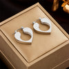 Simple Niche High Grade Cold Style Minimalist Design Hollow Heart Titanium Steel Electroplated Unisex Earrings