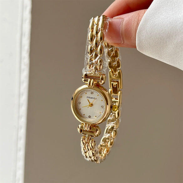 Simple Retro Women's Alloy Watches With Round Dial And Spiral Crown
