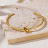 Simple Style Classic Style Knot Titanium Steel 18K Gold Plated Bangle In Bulk