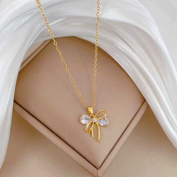 Stainless Steel And Copper Hollow Bow Geometric Light Luxury Style Full Diamond Necklace For Women