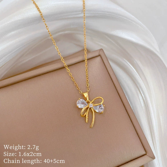 Stainless Steel And Copper Hollow Bow Geometric Light Luxury Style Full Diamond Necklace For Women