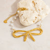 Stainless Steel And Pearl Women's Fashion Clavicle Chain And Bracelet Set With French Bow And Butterfly Design Electroplated