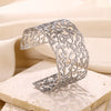 Stainless Steel And Silver Hollow Geometric Women's Bracelet With Hammered Pattern And Electroplating Treatment