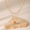 Stainless Steel And Titanium Steel Double Layer Necklace With Oval Bead Chain Twist Chain And Small Gold Ball Pendant Geometric Pattern Electroplating Design For Women