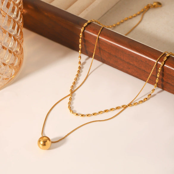 Stainless Steel And Titanium Steel Double Layer Necklace With Oval Bead Chain Twist Chain And Small Gold Ball Pendant Geometric Pattern Electroplating Design For Women