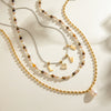 Stainless Steel And Titanium Steel Freshwater Pearl Tiger Eye Geometric Pendant Necklace For Women With Electroplating