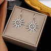 Stainless Steel And Titanium Steel Whirlpool Pattern Hammered Sunflower Pendant Necklace And Ring Set With Snake Bone Chain Electroplated For Women