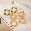 Stainless Steel Flower Patterned Pvd Electroplated Antique Style Women's Pearl Inlaid Garland Earrings