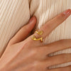 Stainless Steel Geometric Embrace Opening Adjustable Ring For Women With Real Gold Electroplated Treatment
